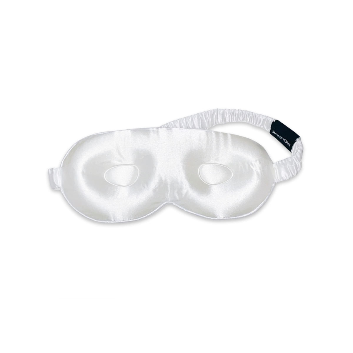 Masque de sommeil blanc en soie de mûrier avec bande élastique, présenté sur fond blanc - Scrunch'it Silk.