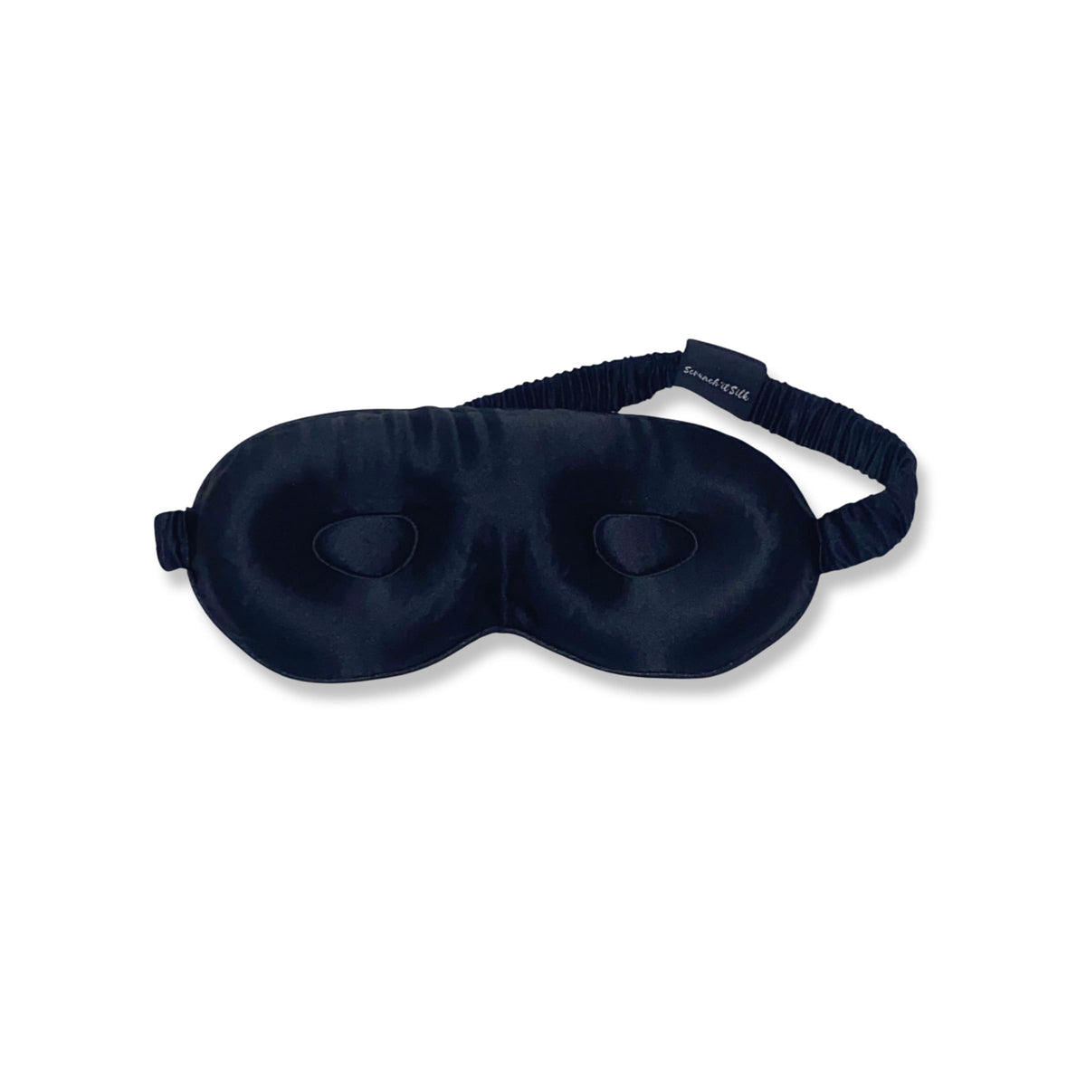 Masque de sommeil noir en soie de mûrier avec bande élastique, présenté sur fond blanc - Scrunch'it Silk.